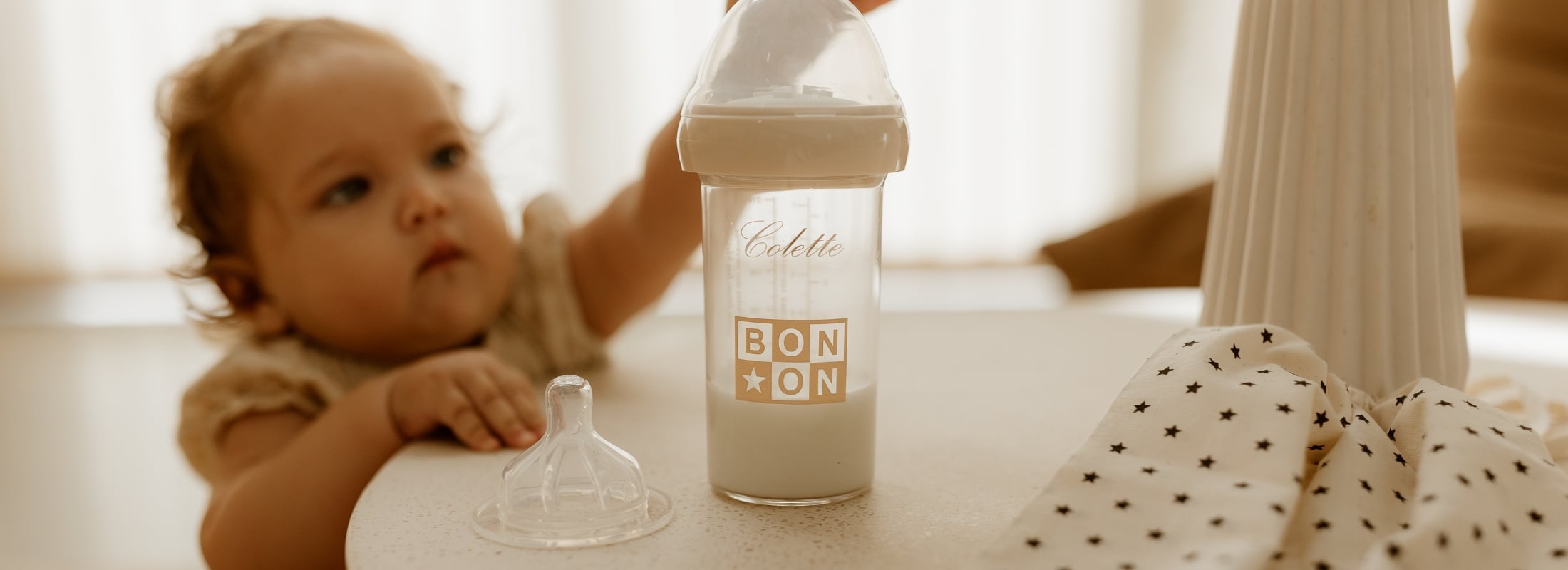 Biberon avec ventre maman